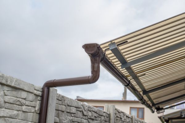Plastic Downspout Installation in Powell